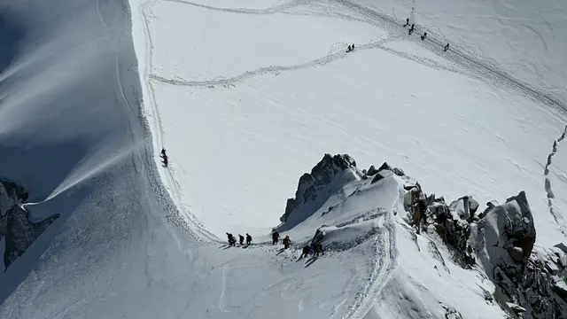 南針峰雪坡上的奮勇攀登